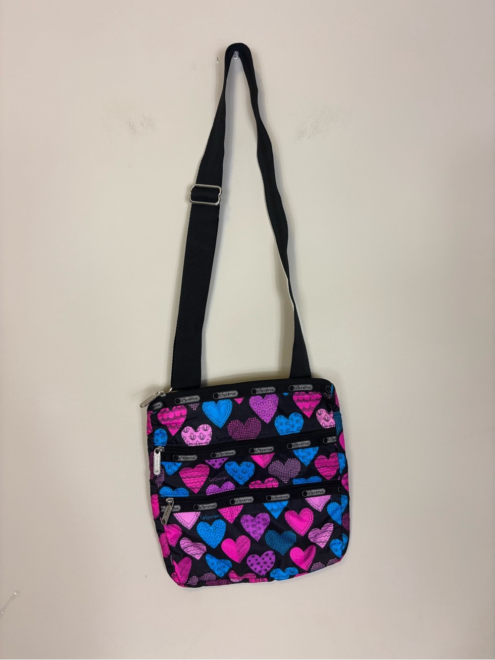 Lesportsac Black Crossbody Bag with Pink & Blue Heart Print